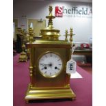 A Howell & James Late XIX Century Striking Gilt Metal Mantel Clock, of chamfered rectangular form