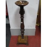 An Early XX Century Oak Pedestal, with a circular turned bowl, raised on turned pedestal and