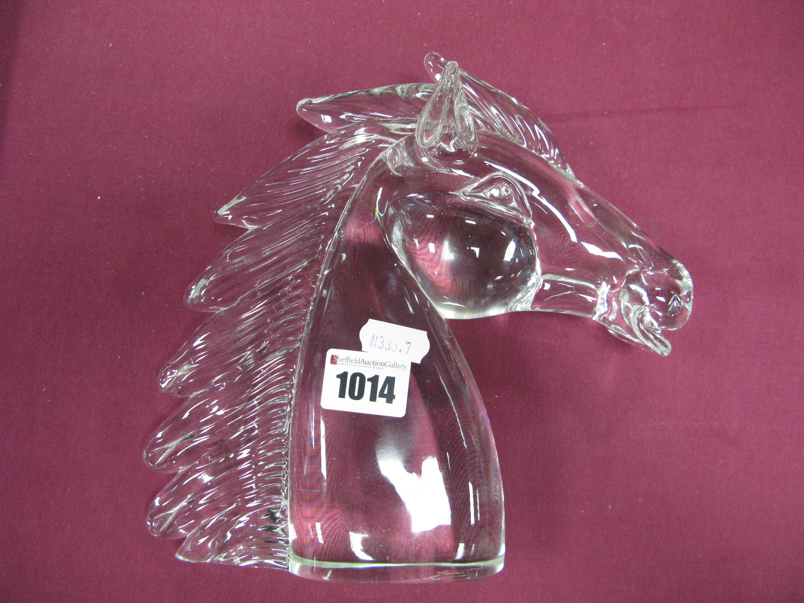 A Clear Glass Model of a Horses Head, engraved signature to base, 20cm high.