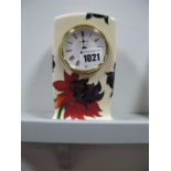 A Moorcroft Pottery Clock, painted in the 'Ruby Red' pattern, designed by Emma Bossons, impressed