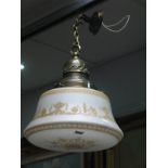 An Early XX Century Ceiling Light, the frosted glass shade with beige classical decoration, brass