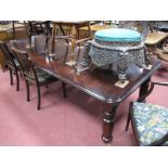 A XIX Century Style Mahogany Wind-Out Table, with moulded edge, on turned legs (two extra leaves),