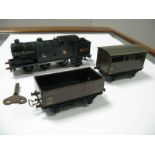 A Hornby Dublo Pre-War Clockwork 0-6-2 T Tank, LMS black, R/No. 6917, probably repainted. PLus two