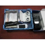 A Sony PSP Hand Held Gaming Console (White) protective case, instruction manual, eleven PSP games,