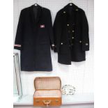 Two Late XX Century British Rail Overcoats, two railway commemorative plates and a suitcase.