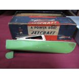 A Tinplate Model Power Boat by Jetcraft, playworn, signs of corrosion, loss of print work noted,
