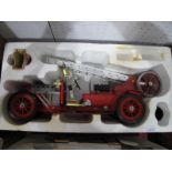 A Mamod FE1 Fire Engine, model has been steamed, funnel and burner present, a white residue noted to