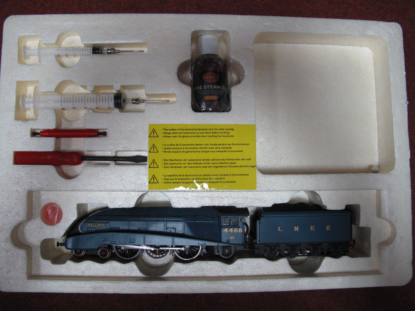 A Hornby 'OO' Gauge Live Steam 'Margate Works', comprising of Class A4 4-6-2 locomotive and eight