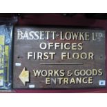 An Original Mid XX Century Wooden and Transferred Sign for 'Bassett-Lowke Ltd Works and Goods