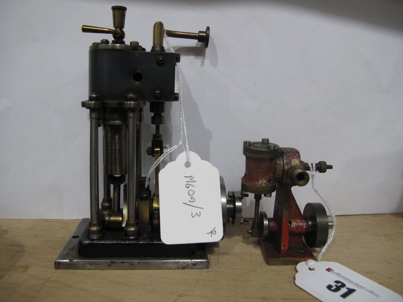 Two Small Engineered Live Steam Engines, a vertical four pillar single cylinder c. 4½ inches tall,