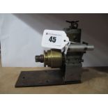 A Mid XX Century 3.49cc Diesel Marine Engine by Frog, on steel plinth, used.