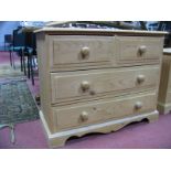 A Pine Chest of Drawers, with two short and two long drawers, on bracket feet.