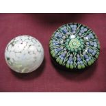 A Perthshire Millefiore Paperweight, with thirteen twist spokes between green and blue florets, '