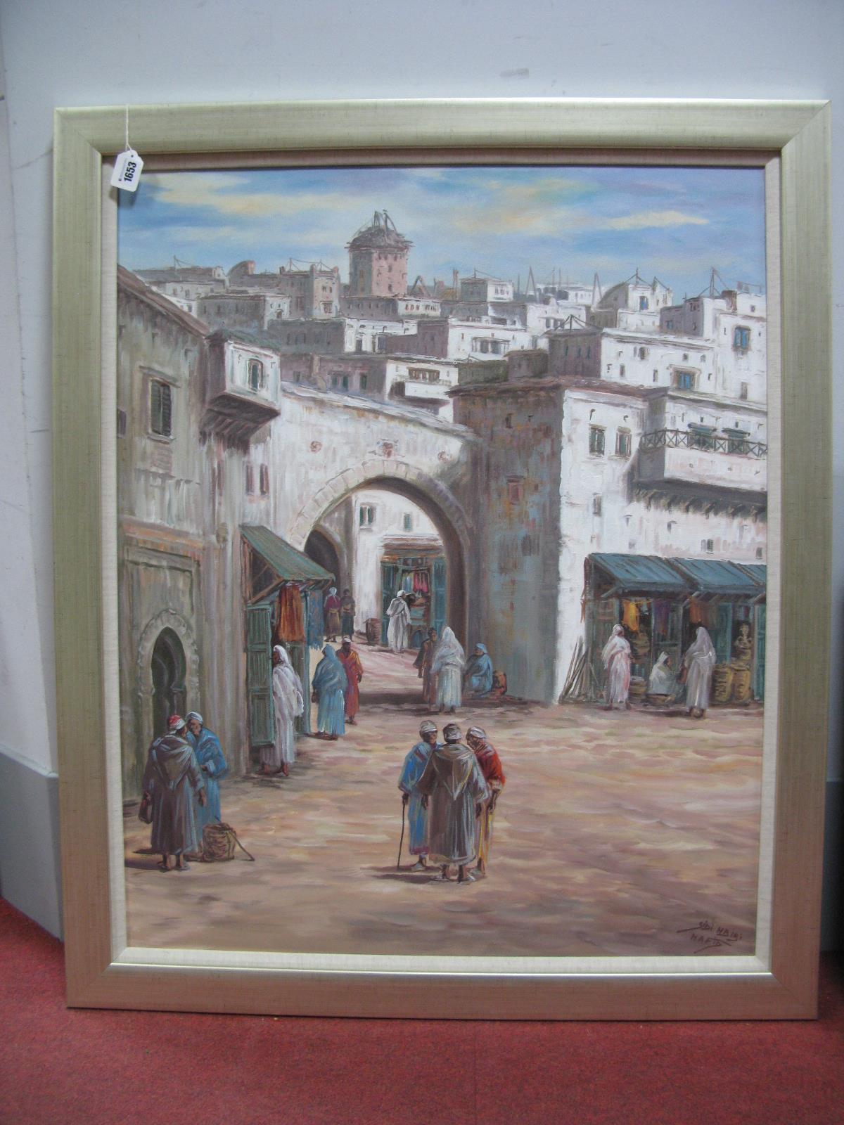 SIDI HBIBI HAFID (Moroccan, XX Century) A Moroccan Street Scene, with figures, on on canvas,