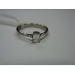 A Modern Emerald Cut Single Stone Diamond Ring, four claw set. *Koh-I-Noor Diamonds (Amsterdam)