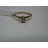 A 9ct Gold Single Stone Diamond Ring, illusion set, stamped "10".