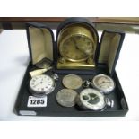 A Decorative Gilt Cased Travelling Bedside Clock, the circular dial with Arabic numerals, in