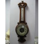 An Early XX Century Oak Cased Banjo Barometer, with thermometer to neck, 82cm high.