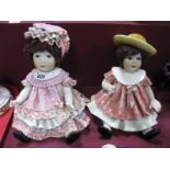 Two Italian Pottery Seated Dolls, approximately 25cm high.