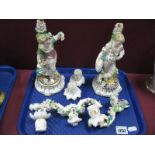 Two XIX Century Bevington Porcelain Twin Branch Candlesticks, with flower girl and flower boy