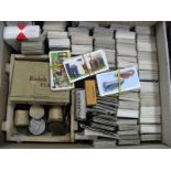 A Quantity of Cigarette Cards, coins, medallions,glass negatives, depicting nudes.