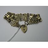 A 9ct Gold Gate Link Bracelet, to heart shape padlock clasp.