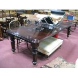 A XIX Century Style Mahogany Wind-Out Table, with moulded edge, on turned legs (two extra leaves),
