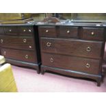 A Pair of Stag Style Chests of Drawers, each with three short drawers and two long drawers on