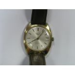 Longines; A Vintage Automatic Gent's Wristwatch, the signed dial with line markers, date aperture