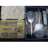 An Art Deco Style Cased Silver Dressing Table Set, hallmarked Birmingham 1955, of three pieces, plus
