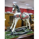 A XX Century Grey Painted Rocking Horse.