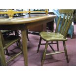 1960's Oval Shaped Teak Table, together with a set of four Ash kitchen chairs.