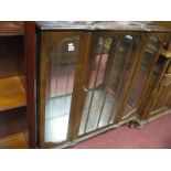 A Mid XX Century Walnut China Cabinet, on squat cabriole legs.