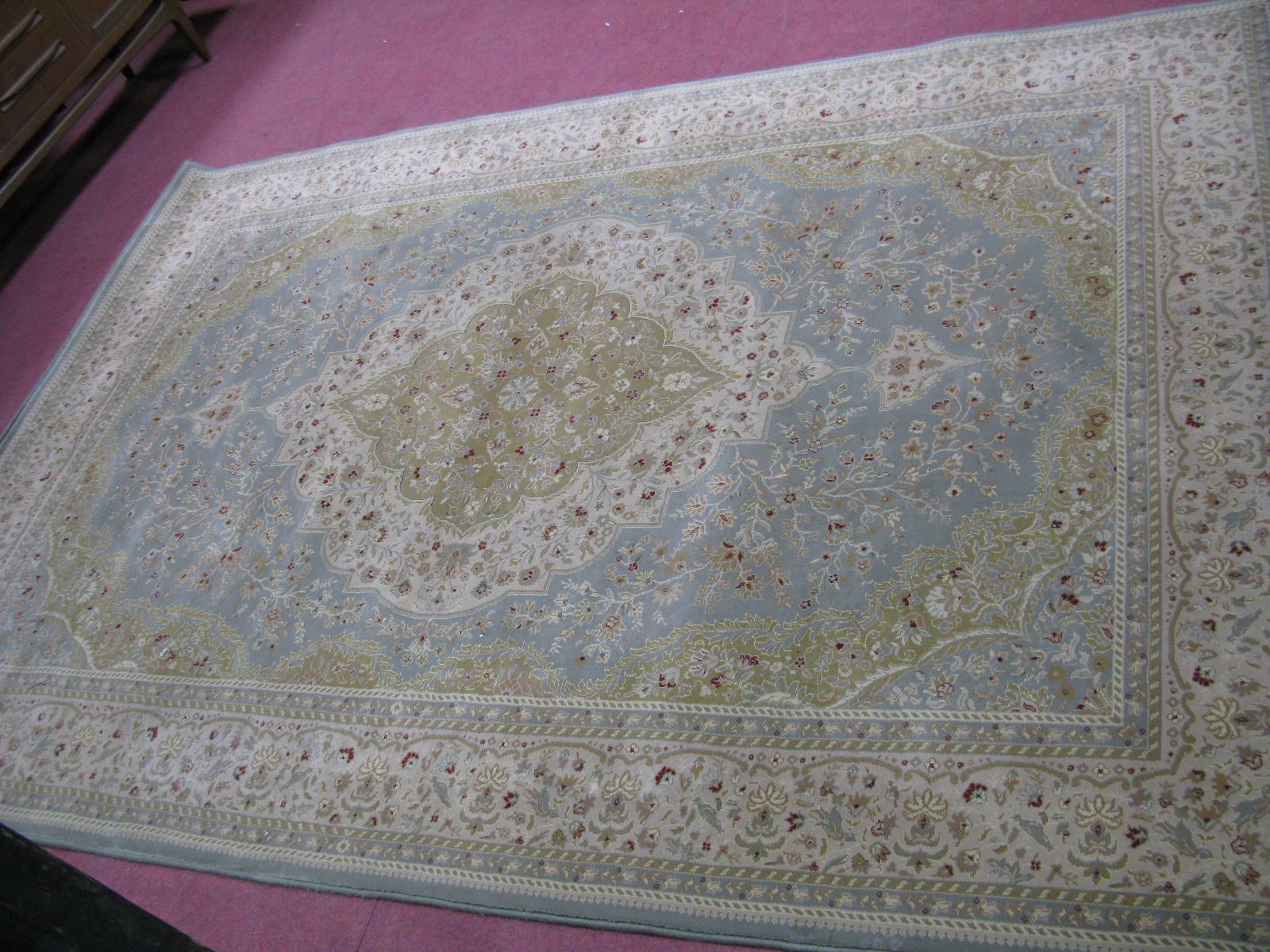 Imperial Polypropylene Turkish Rug, 290 x 200cm, with floral decoration on beige ground.