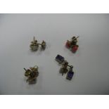 A Pair of Single Stone Opal Set Earstuds, four claw set; together with a pair of amethyst single