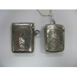 A Hallmarked Silver Vesta Case, leaf scroll engraved; together with another example, leaf scroll