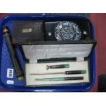 An Early XX Century Telescope, ebonised box with mother of pearl inlay, cased desk set including