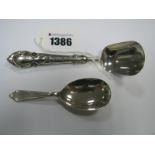 A Hallmarked Silver Caddy Spoon, FH, Sheffield 1973; together with a shovel style spoon. (2)