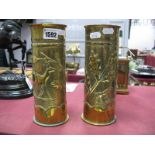 A Pair of Brass Trench Art Shell Case Vases, embossed and stipple decoration of birds and deer