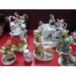 A Continental Figure Group of Children around a table, Friedal, West German hand painted figures,