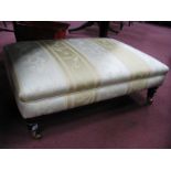 A Regency Style Foot Stool, circa 2000's, upholstered in a lemon floral and striped damask fabric on