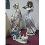 Lladro Figures, a girl holding on to her bonnet, a lady in 1920's costume, and a girl feeding ducks.