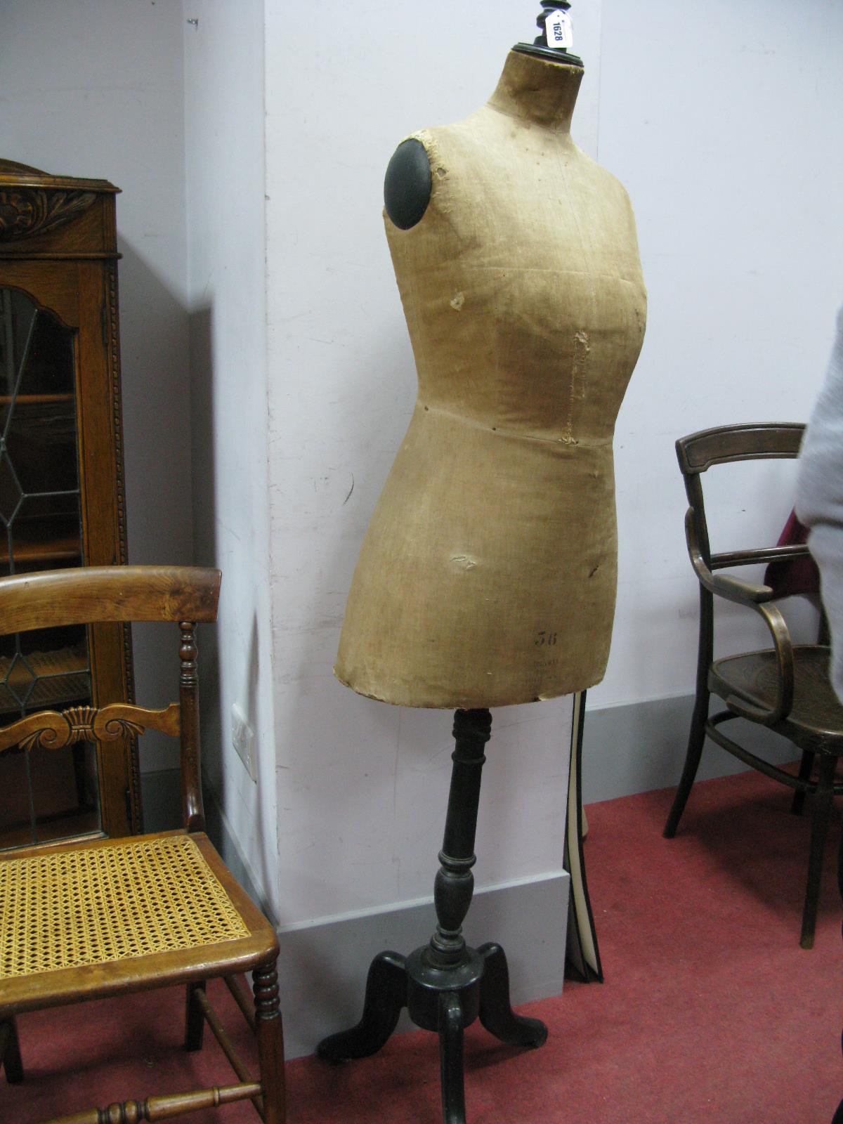 A Circa 1900 Stockman, Paris Tailors Female Dummy, with fabric covering on turned ebonised support