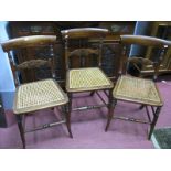 A Set of Six XIX Century Ash Bedroom Chairs, each with scroll carved bar back, turned splayed legs