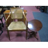 An Oval Shaped Wine Table, together with a carver chair with a caned back and seat. (2)