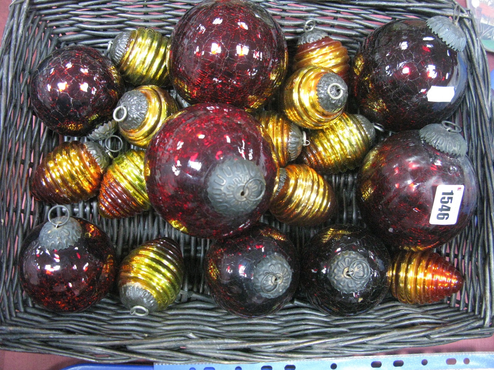 A Collection of Dark Red Crackle Type Glass Witches Style Balls, together with yellow/orange