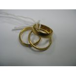 Three 22ct Gold Wedding Bands. (3)