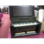 A Travelling Organ, possibly military circa 1900, with collapsible concertina legs, keyboard, in