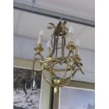 Gilt Scroll Work Four Branch Candelabra, with leaf connectors decoration.