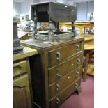 A 1930's Oak Chest of Four Drawers, in bracket feet, 81cm wide and oak coffee table.